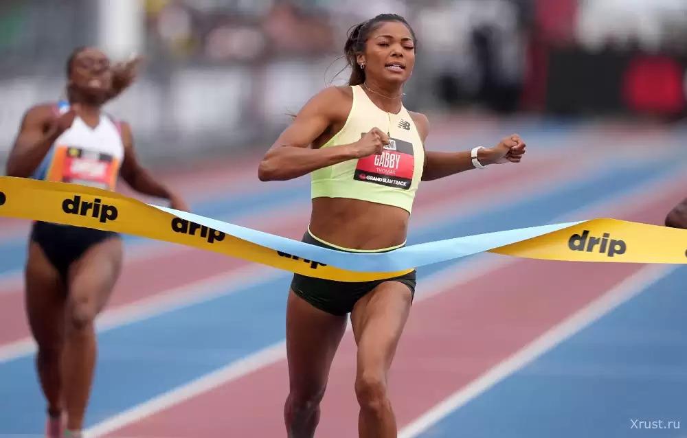 A man interfered with sprinter Gabby Thomas in winning a race